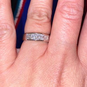 Sterling silver ring with 4 cz square stones